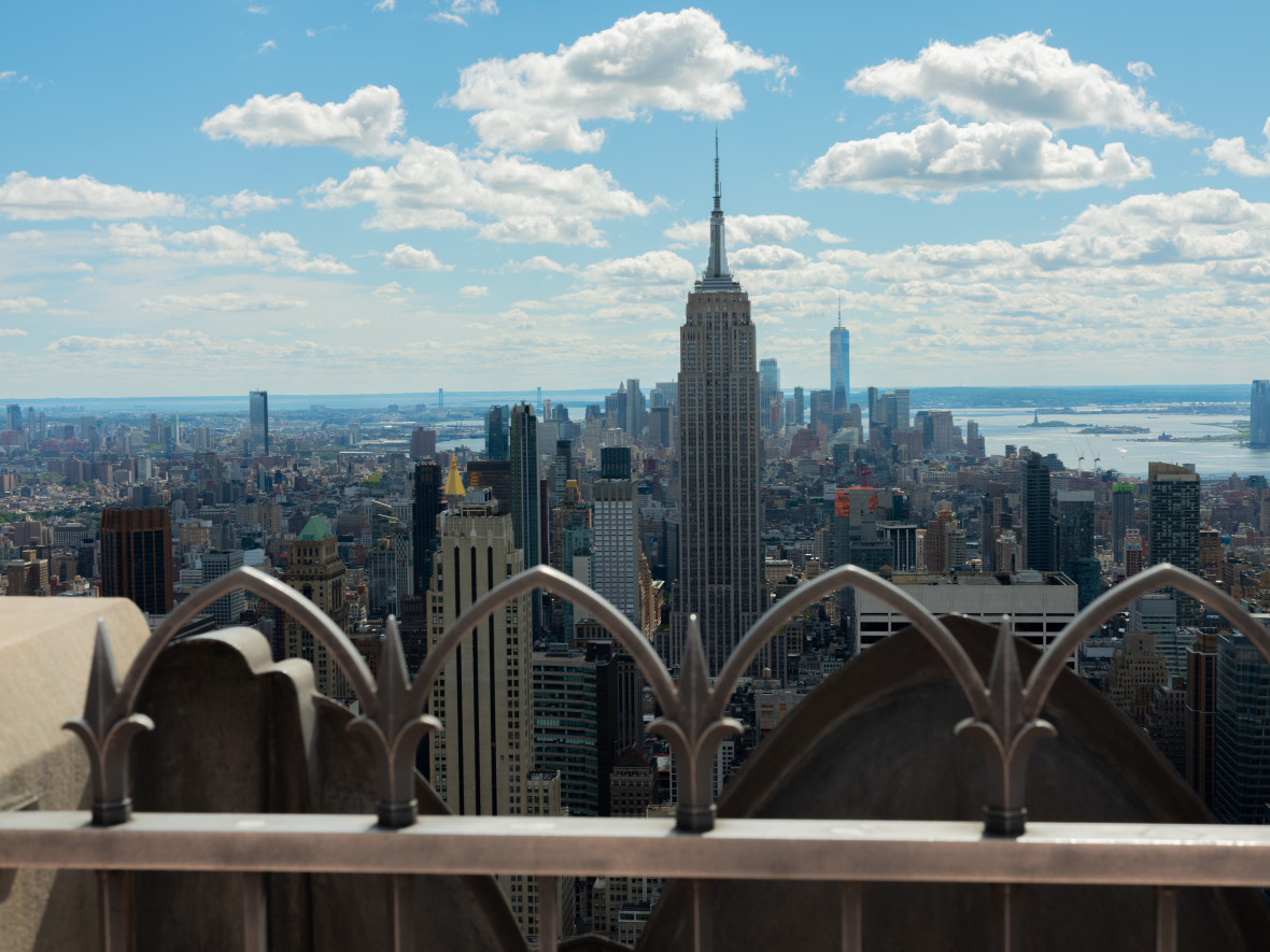 The view downtown from the Top of the Rock featuring the Empire State Building