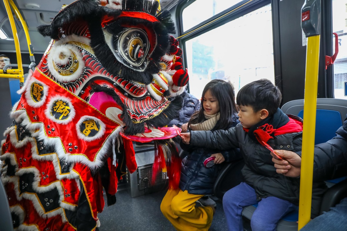 Lunar New Year lion dancer bus