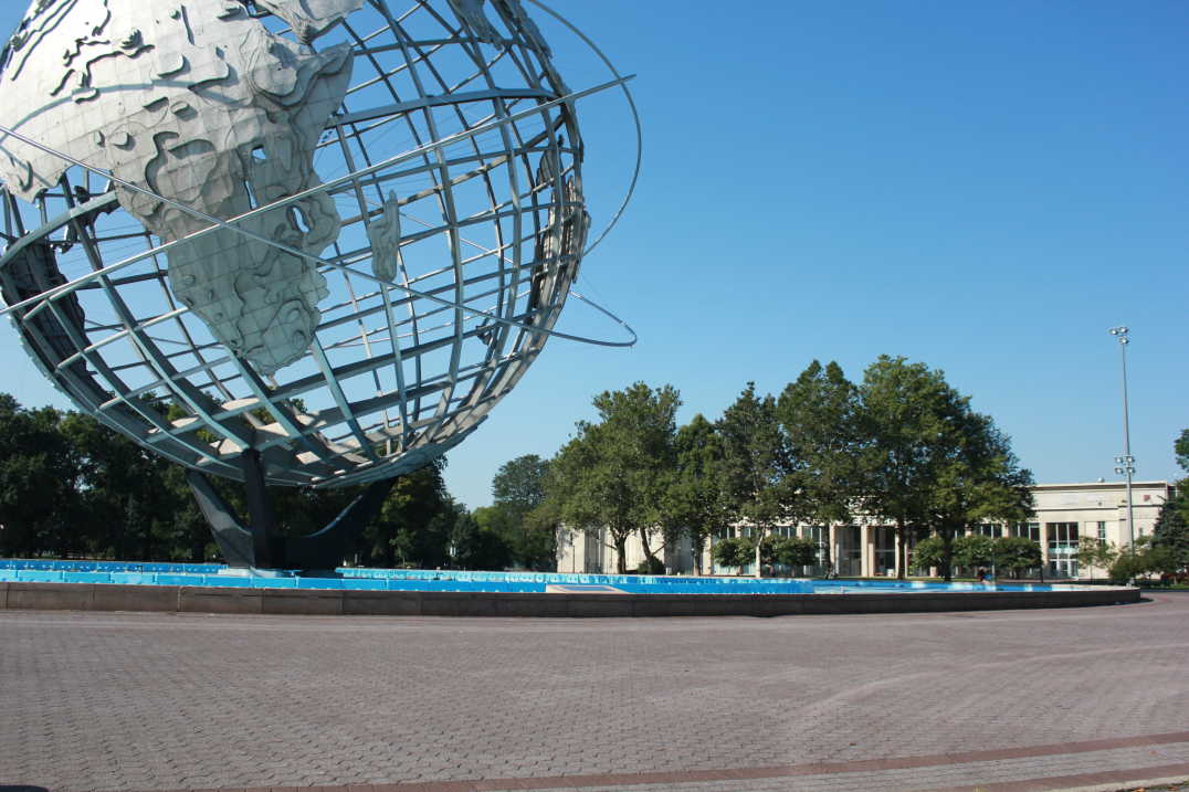 The Unisphere with Queens Museum in background in Flushing
