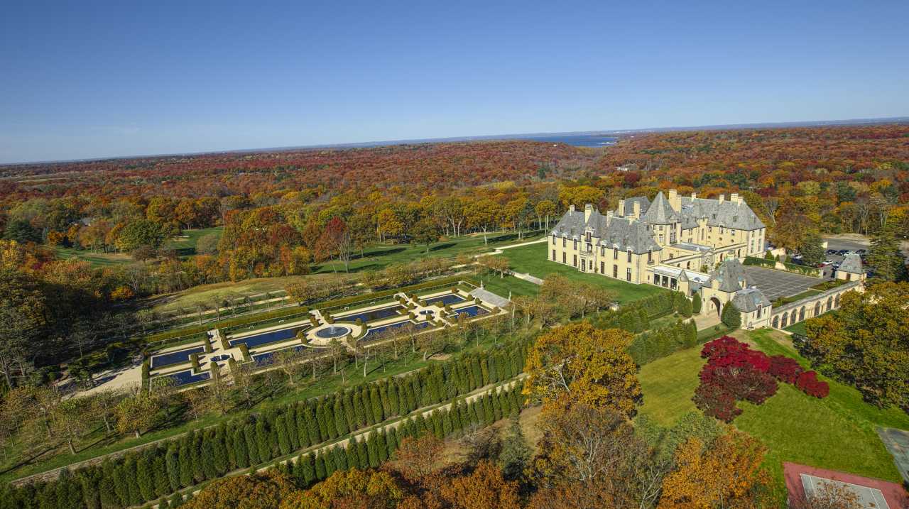 Exterior and grounds of Oheka Castle in autumn