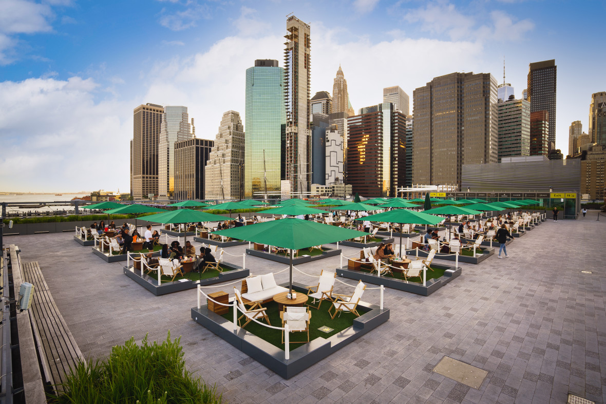 Overhead view of The Greens at Pier 17 with the east side of lower Manhattan in the background