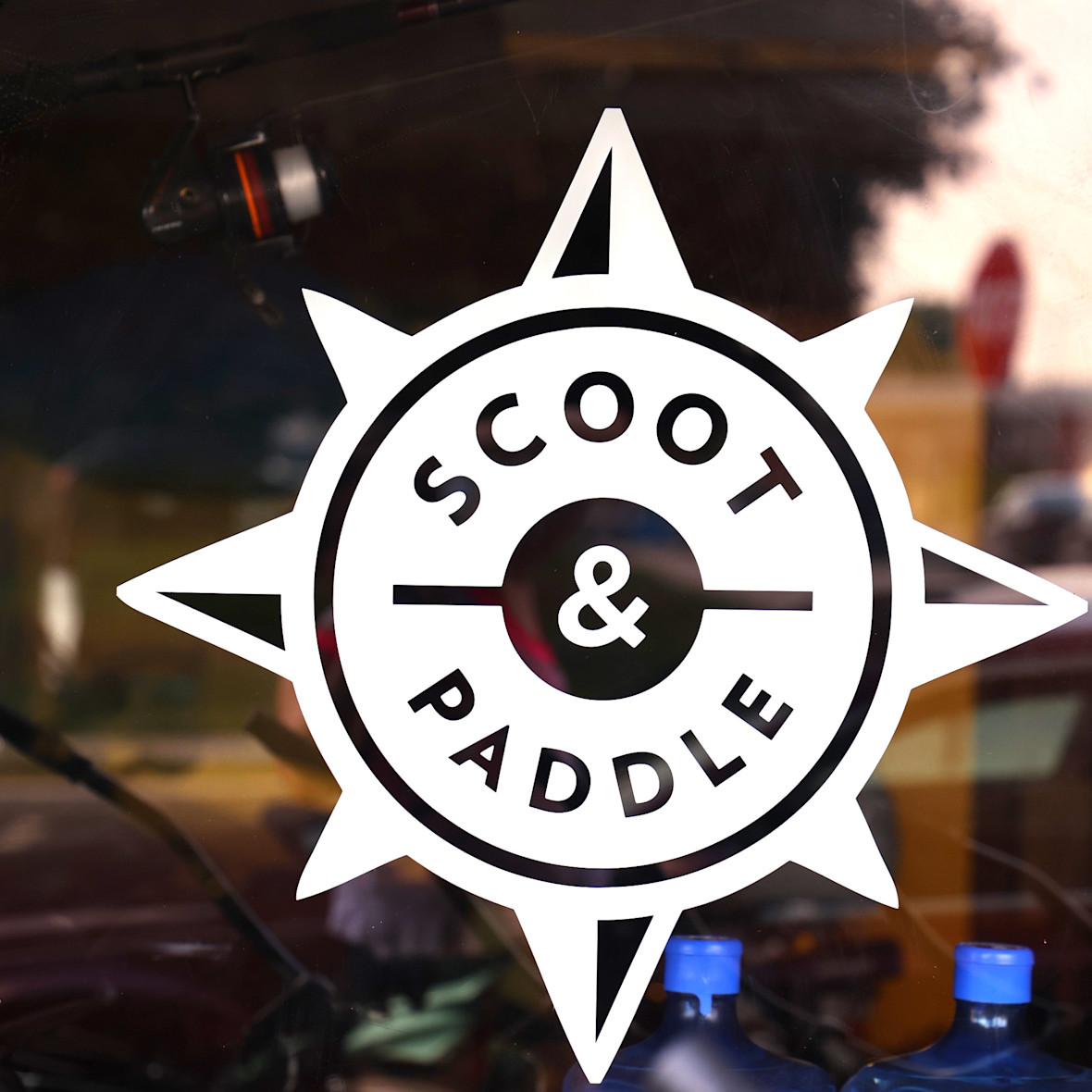 Scoot & Paddle door sign in Stratford