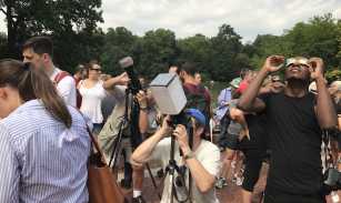 People observing the 2017 solar eclipse in Central Park