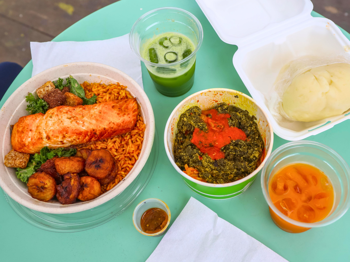 Salmon jollof rice bowl and egusi with iyan at The Cradle 