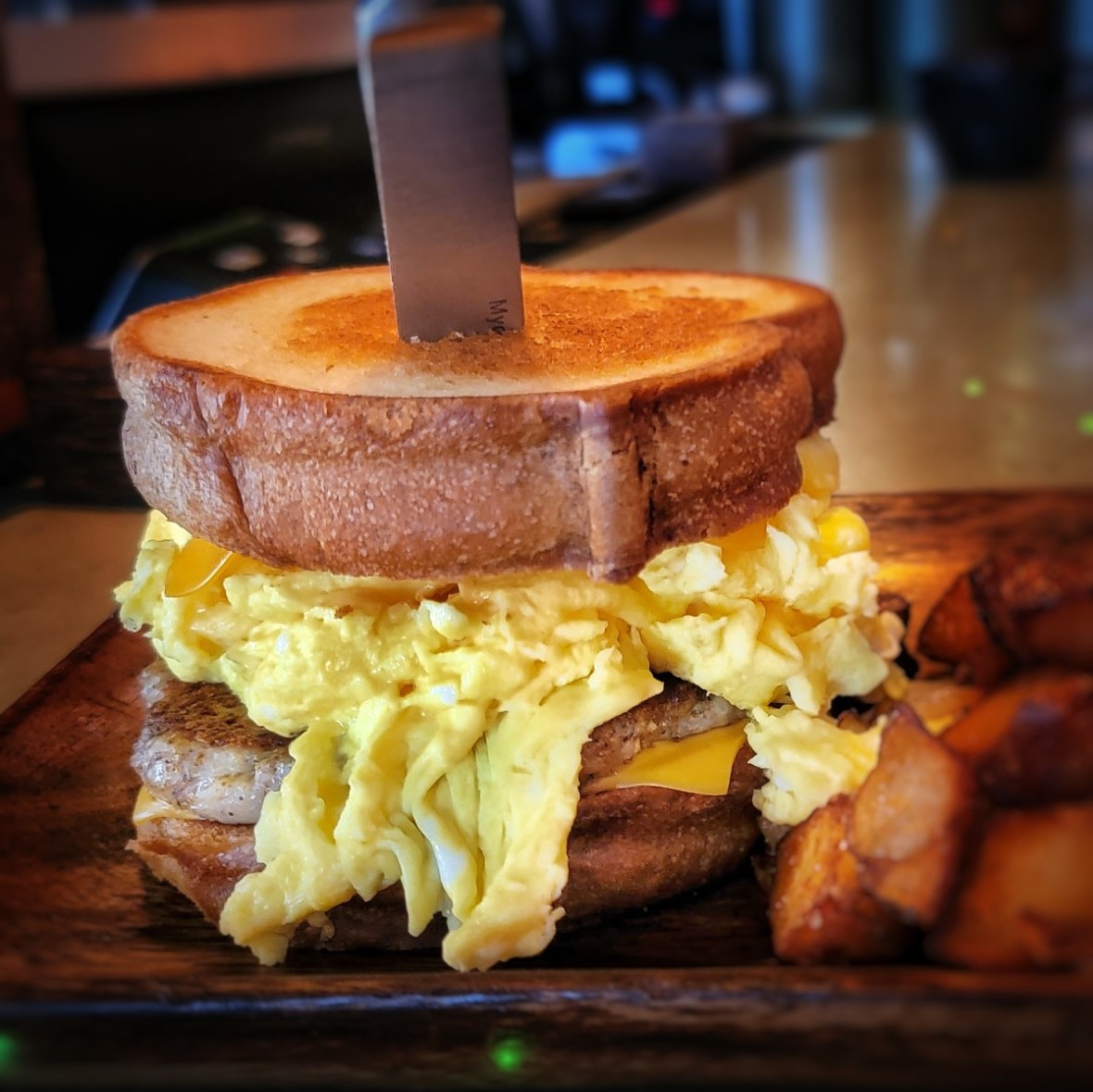 House made sausage egg and cheese on brioche toast from Ovelia Psistaria