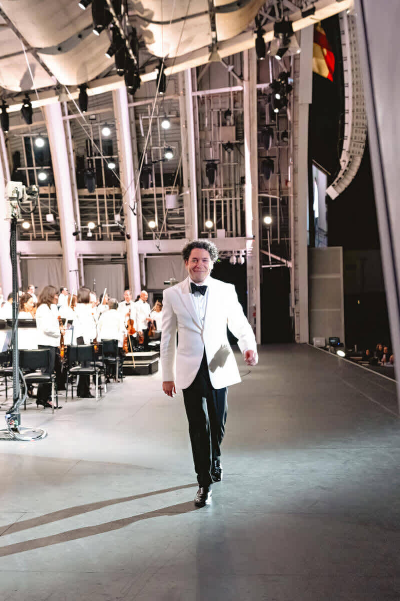 Music and Artistic Director Gustavo Dudamel headed backstage
