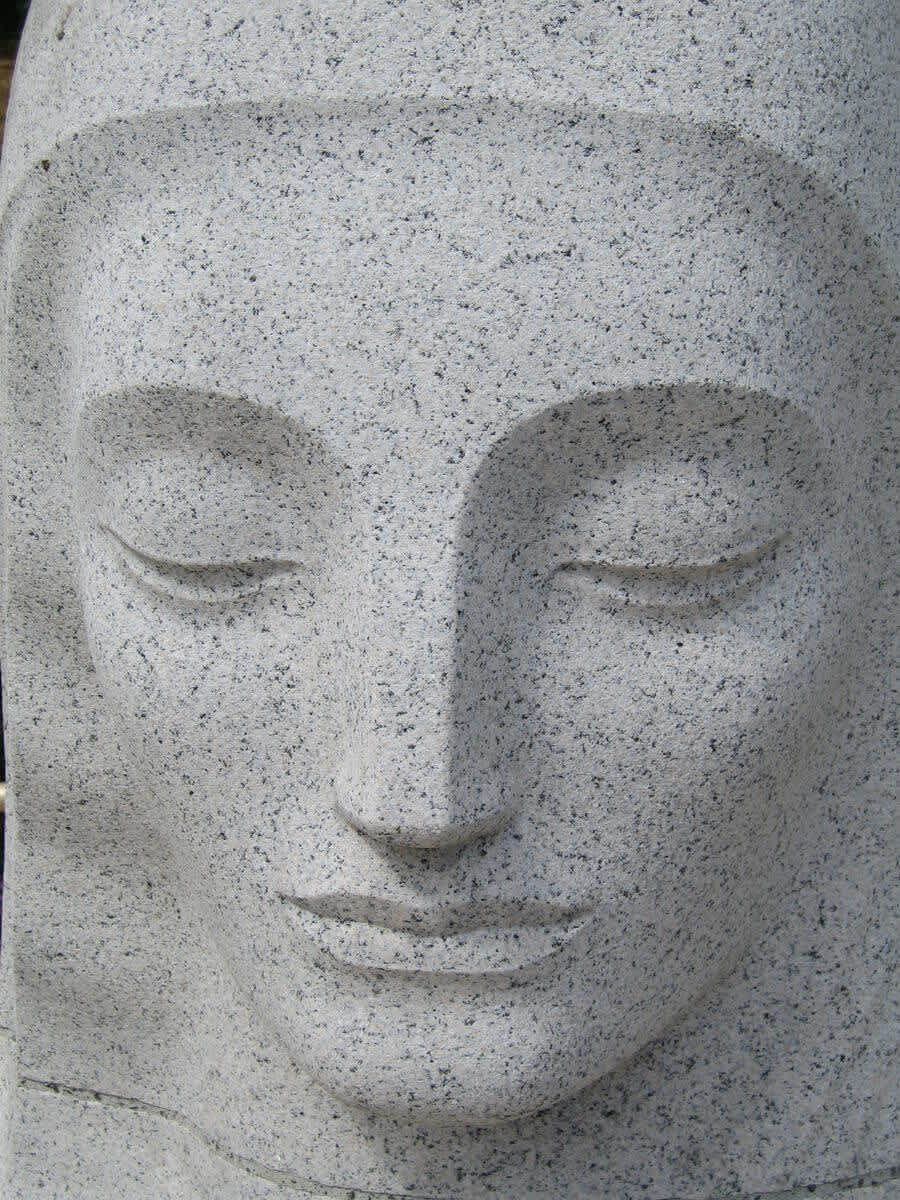 Close-up of the face of the Muse of Music, carved by sculptor George Stanley