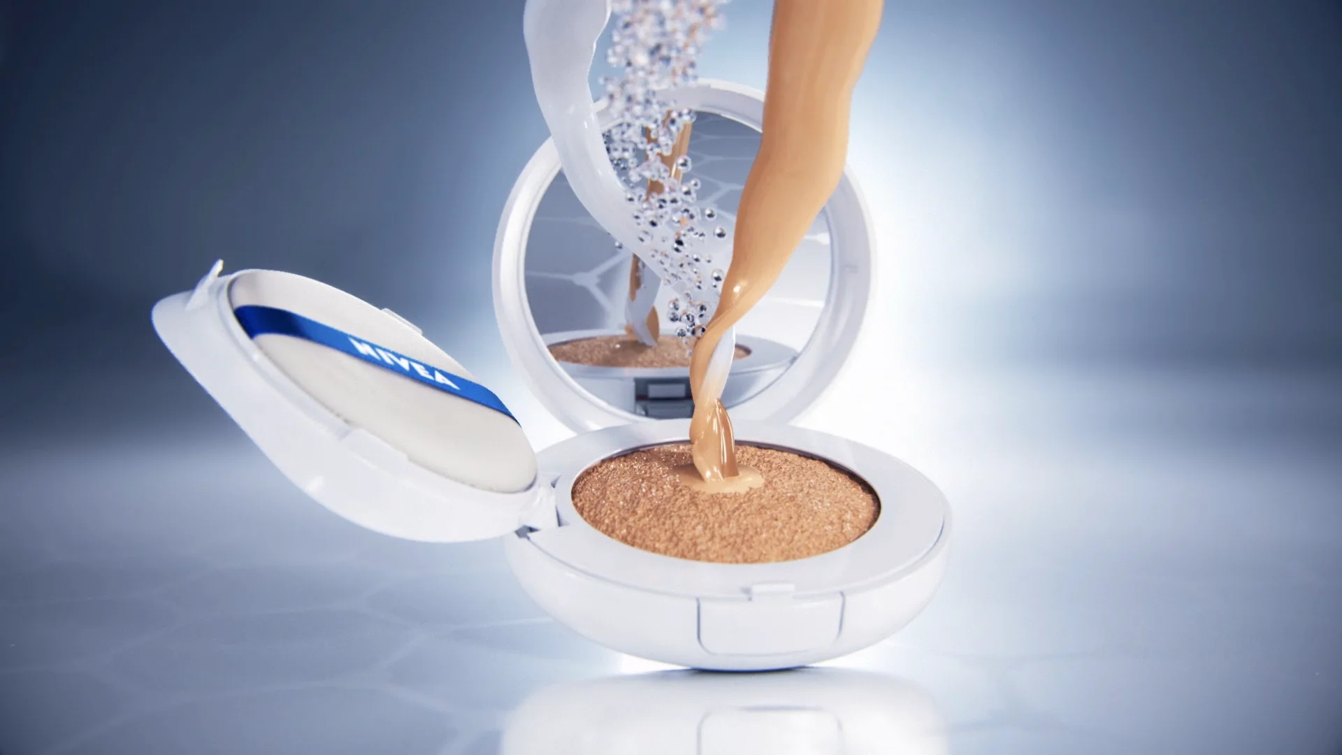 a nivea make up packshot which is opened and the ingredients are falling into the cushion. the ingredients are brown liquid, a white liquid and blueish bubbles