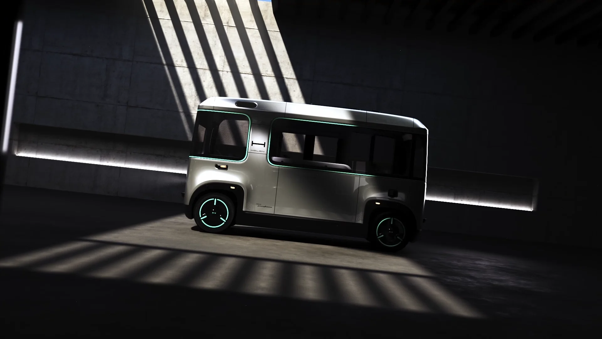 a round shaped mini bus in front of a conrete wall with lights and shadows on it