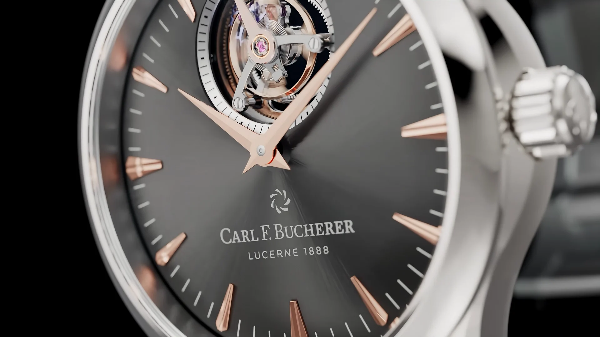 we se the front of a silver, black and bronze colored Carl F. Bucherer Watch with a turbillon