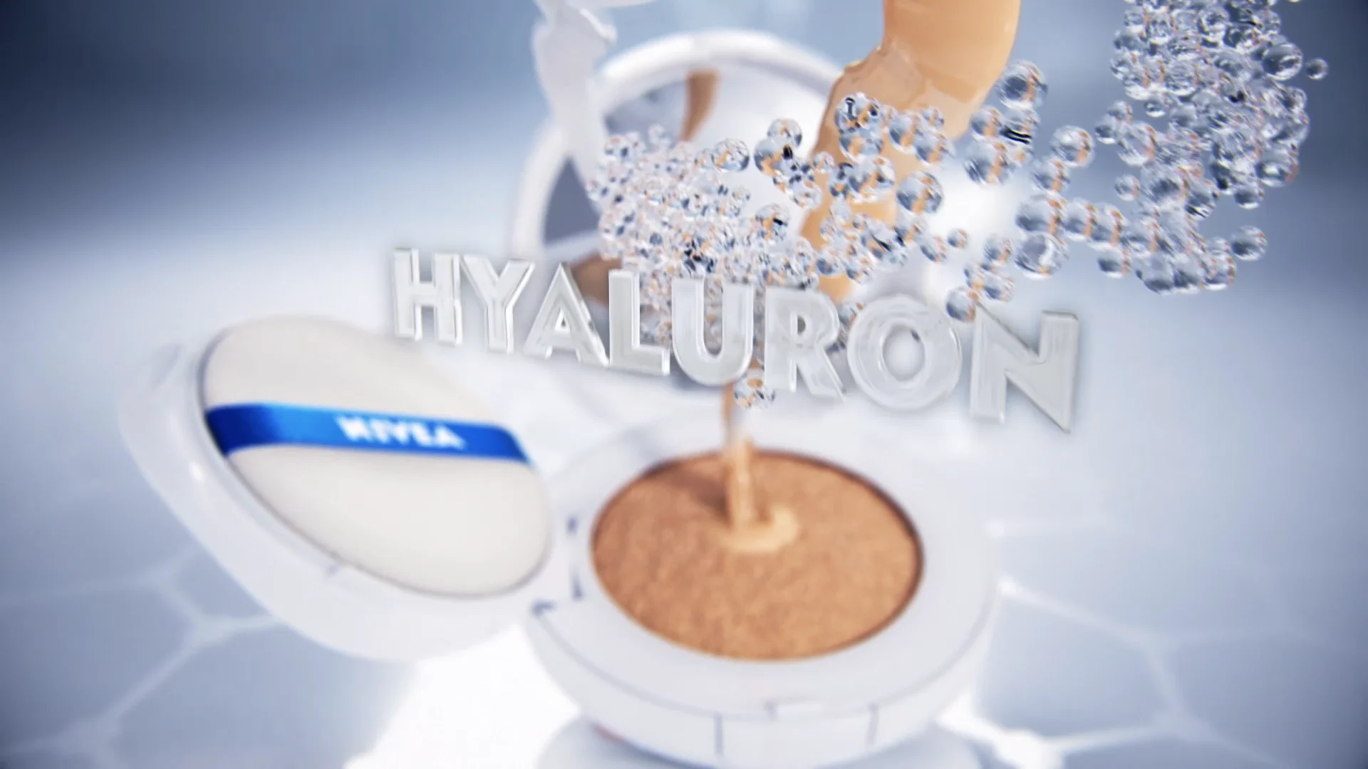 a nivea make up packshot which is opened and the ingredients are falling into the cushion. the ingredients are brown liquid, a white liquid and blueish bubbles. the word HYALURON is written into the air in front of the packshot
