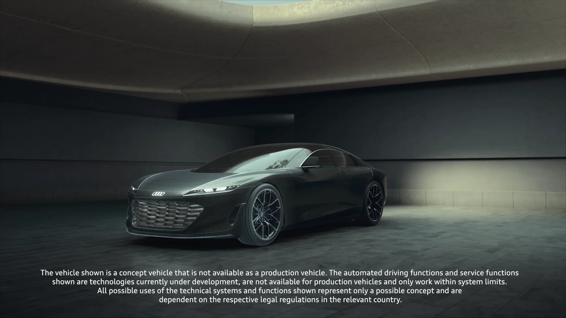 a black audi concept car in a concrete textured room with some light coming from above