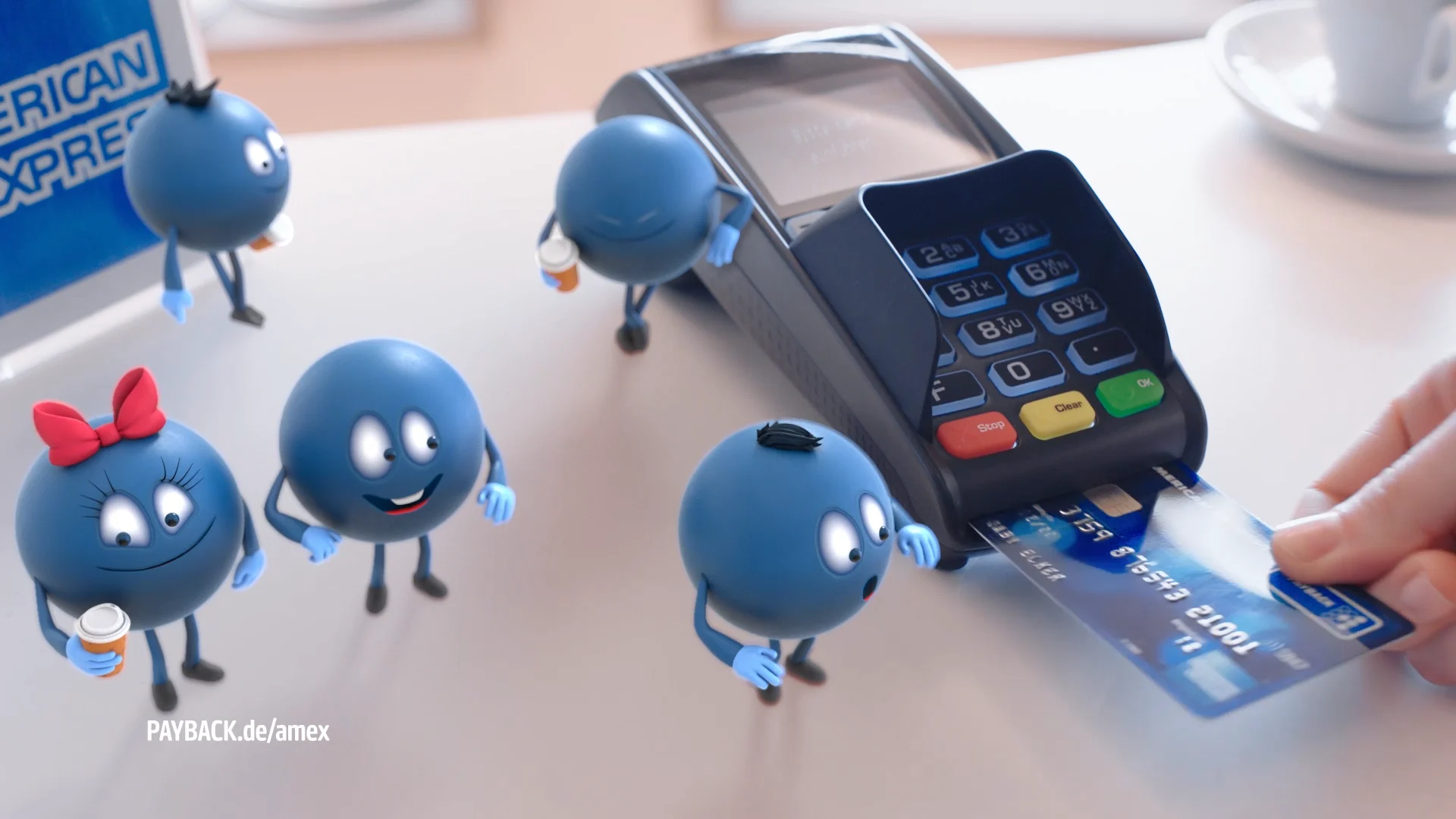 five blue 3d characters with different accessoires smiling and performing on a till tape next to a card reader with a payback card in it
