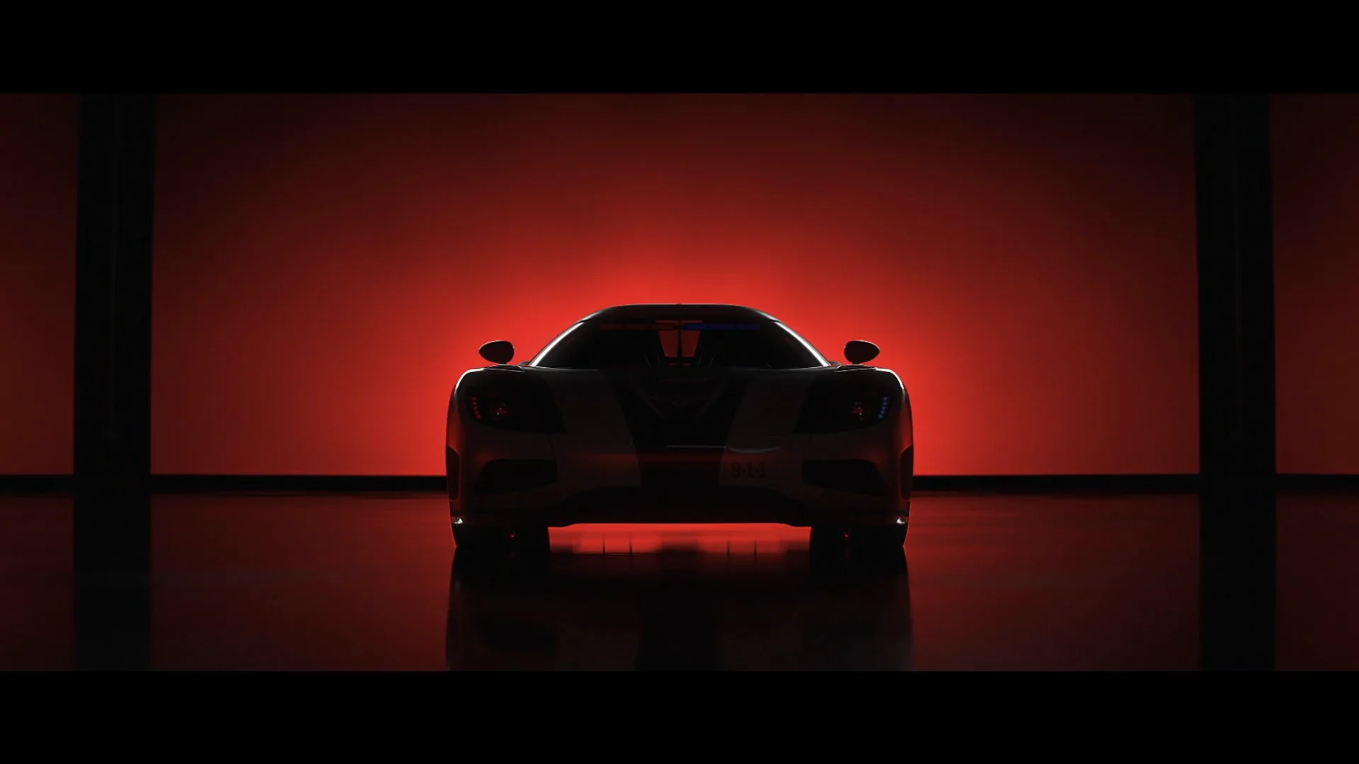 a undefined racing car in the shadow in front of a red glowing backlight