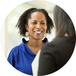 Woman smiling while having a conversation