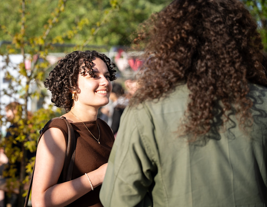 Two young people talking