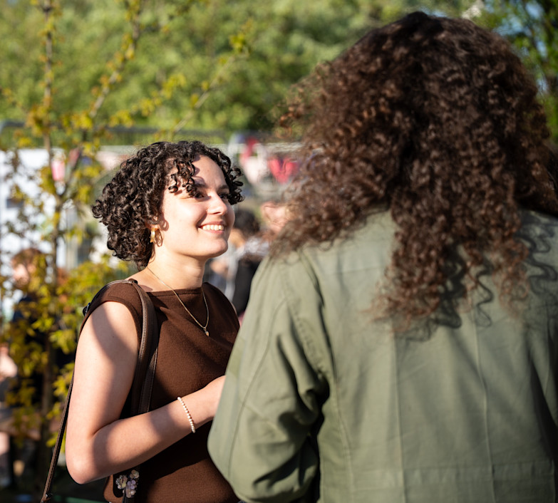 Two young people talking