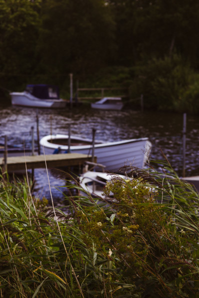 Little boats in the stream and wild nature