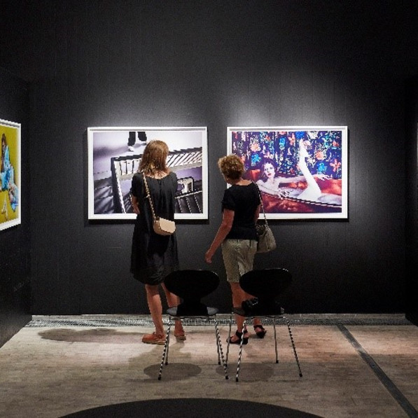 Two women looking at images at Trapholt