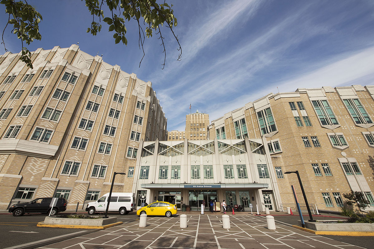 The main entrance to Harborview Medical Center on a sunny day. 