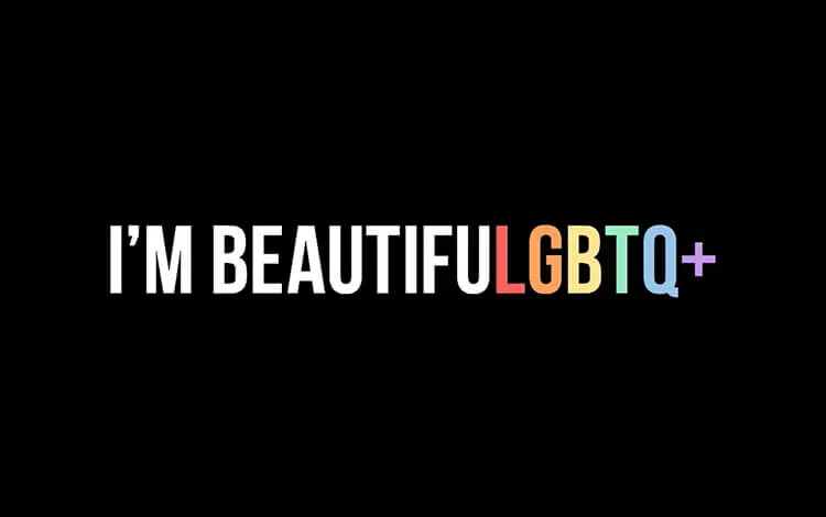 I'm Beautiful is spelled out in white letters on a black backdrop, and the 'l' in beautiful leads into a rainbow of the LGBTQ+ acronym.