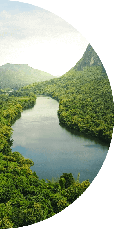 A river runs through a green landscape