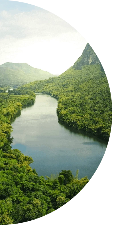 A river runs through a green landscape