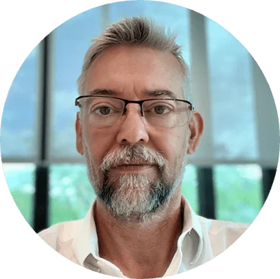 Headshot of white male with glasses and beard.