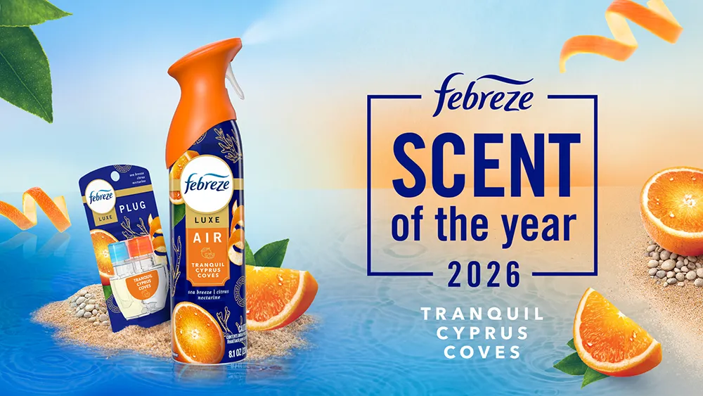 Febreze products are shown in the new Tranquil Cyprus Coves scent next to fresh oranges on a sandy, water-bordered scene. Febreze Scent of the Year 2026 copy is also shown on screen.
