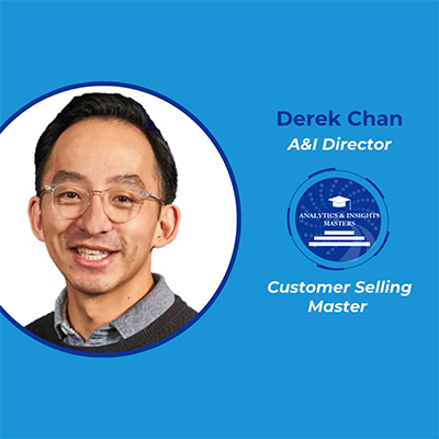 Derek Chan smiles at the camera wearing glasses and a collared shirt and sweater. To his right is the A&I Masters logo along with his name and title as an A&I Director, Customer Selling Master