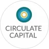 A circle made up of orange, white green, blue and teal circles. Circulate Capital logo. 