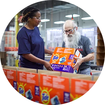 People in Tide manufacturing facility