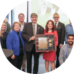 Gerard Baillelly is awarded the Henry F. Whalen, Jr. Award of Excellence for his contributions to business within chemical enterprise.