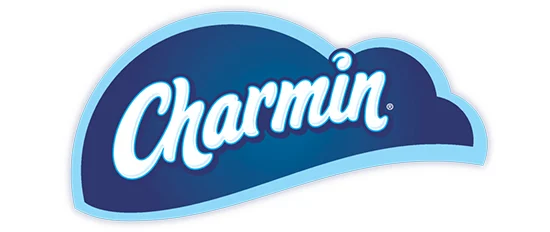 The illustrated Charmin brand logo is designed in the shape of a cloud. It's dark blue with a light blue border. The Charmin name is placed in the center and written in white letters.