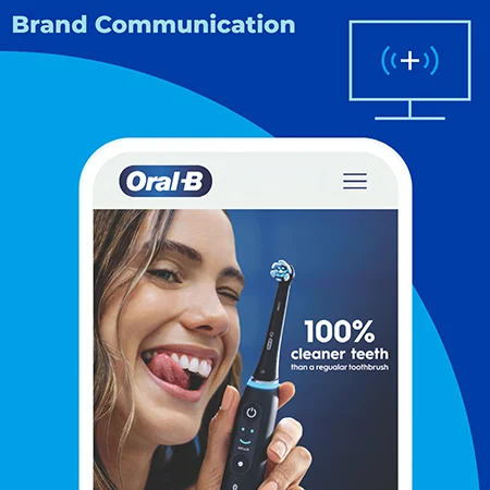 A smartphone display shows an image of a woman holding an electric toothbrush in front of a blue background with the words Brand Communication in the top left corner.