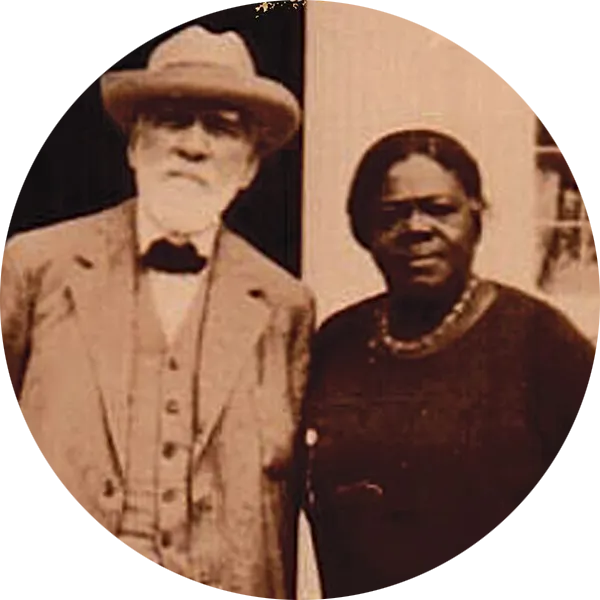 Historic photograph of James N. Gamble and Mary McLeod Bethune standing outside a building.