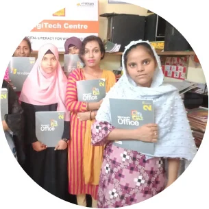 Six women are holding folders with the Microsoft Office logo on it. They are standing in front of a sign that says “DigiTech Centre.” 