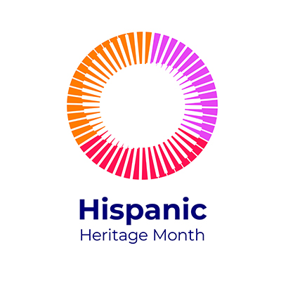 A pink, red and orange circle  against a white background. Blue text below it says “Hispanic heritage month.”