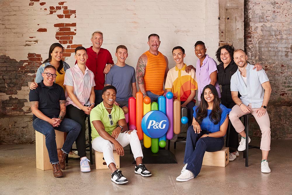 P&G employees around P&G pride logo