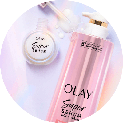 One bottles of OLAY Super Serum Body Wash in front of a light purple background and next to it is an Olay Super Serum.