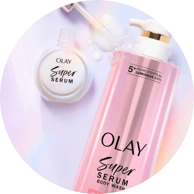 One bottles of OLAY Super Serum Body Wash in front of a light purple background and next to it is an Olay Super Serum.