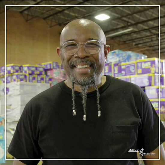 Pastor Rudy Rasmus, cofounder of Bread of Life, partners with Matthew 25: Ministries and Procter & Gamble to serve poor and underserved people in Houston.