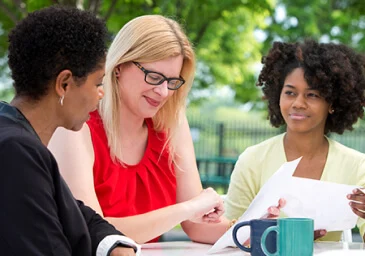 Three women talking