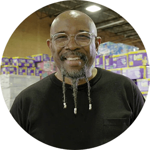 Pastor Rudy Rasmus, cofounder of Bread of Life, partners with Matthew 25: Ministries and Procter & Gamble to serve poor and underserved people in Houston.