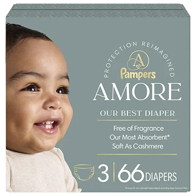 Packaging for Pampers AMORE diapers, featuring a smiling baby and text that reads 'Our Best Diaper,' with claims of being 'Our Most Absorbent,' 'Soft As Cashmere,' and 'Free of Fragrance.'