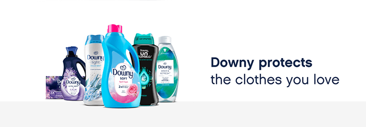 Five various colorful bottles of laundry detergent and a box of fabric softener stand next to each other against a white background. To the right, black text says “Downy protects the clothes you love.”