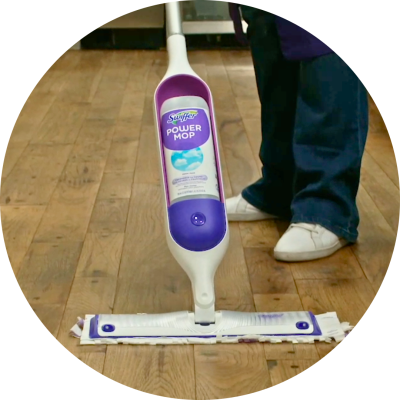 Person using Swiffer PowerMop