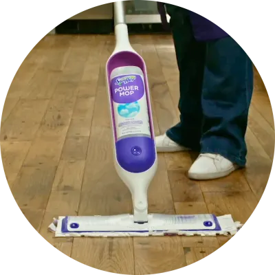 Person using Swiffer PowerMop