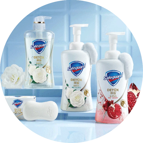 Packages of Safeguard Detox Body Wash in various scents, against a white tiled background