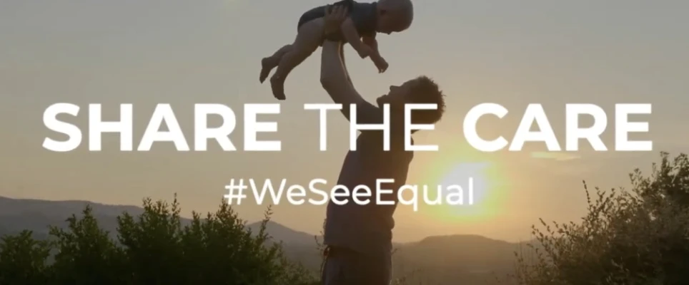 Father lifting his baby in the air with text over the image: SHARE THE CARE #WeSeeEqual